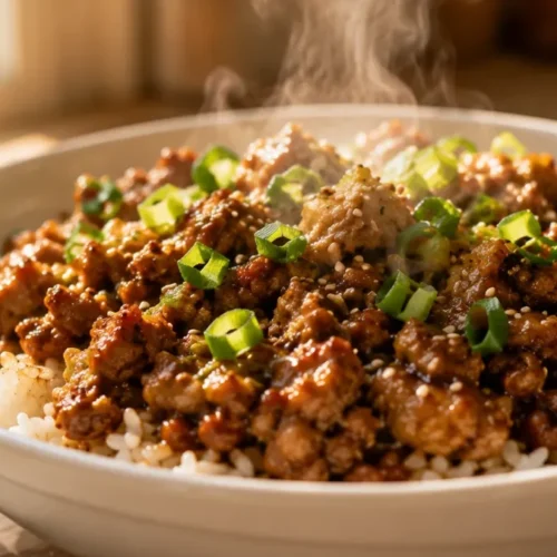 30-Minute Teriyaki Ground Turkey Rice Bowls (Cheap High Protein) 6 Teriyaki Ground Turkey Rice Bowls topped with sesame seeds and green onions, ready to eat